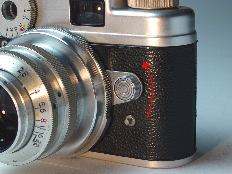 Removing Lenses - Release arm unlocked and partially open