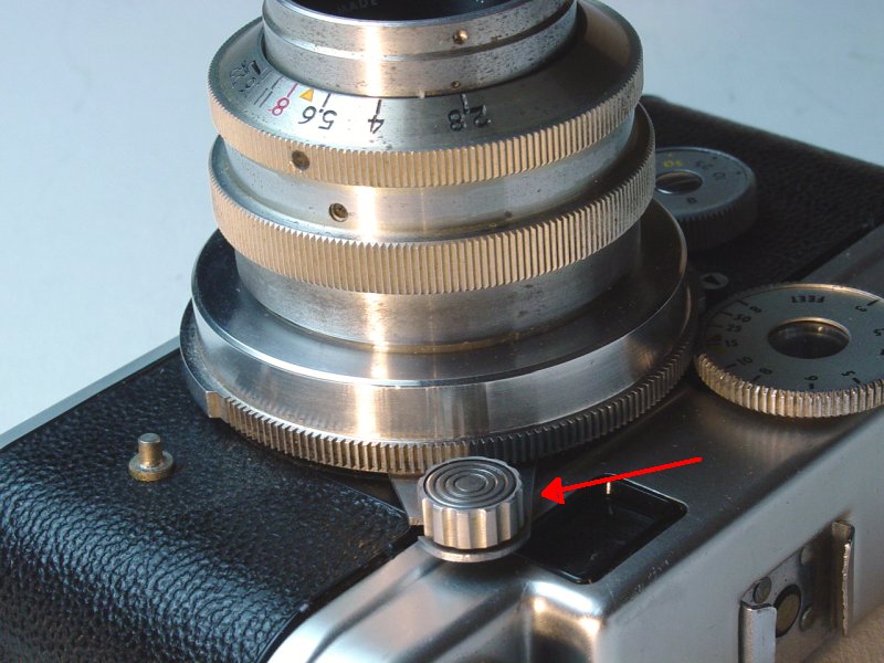 Removing Lenses - Release arm unlocked and fully open