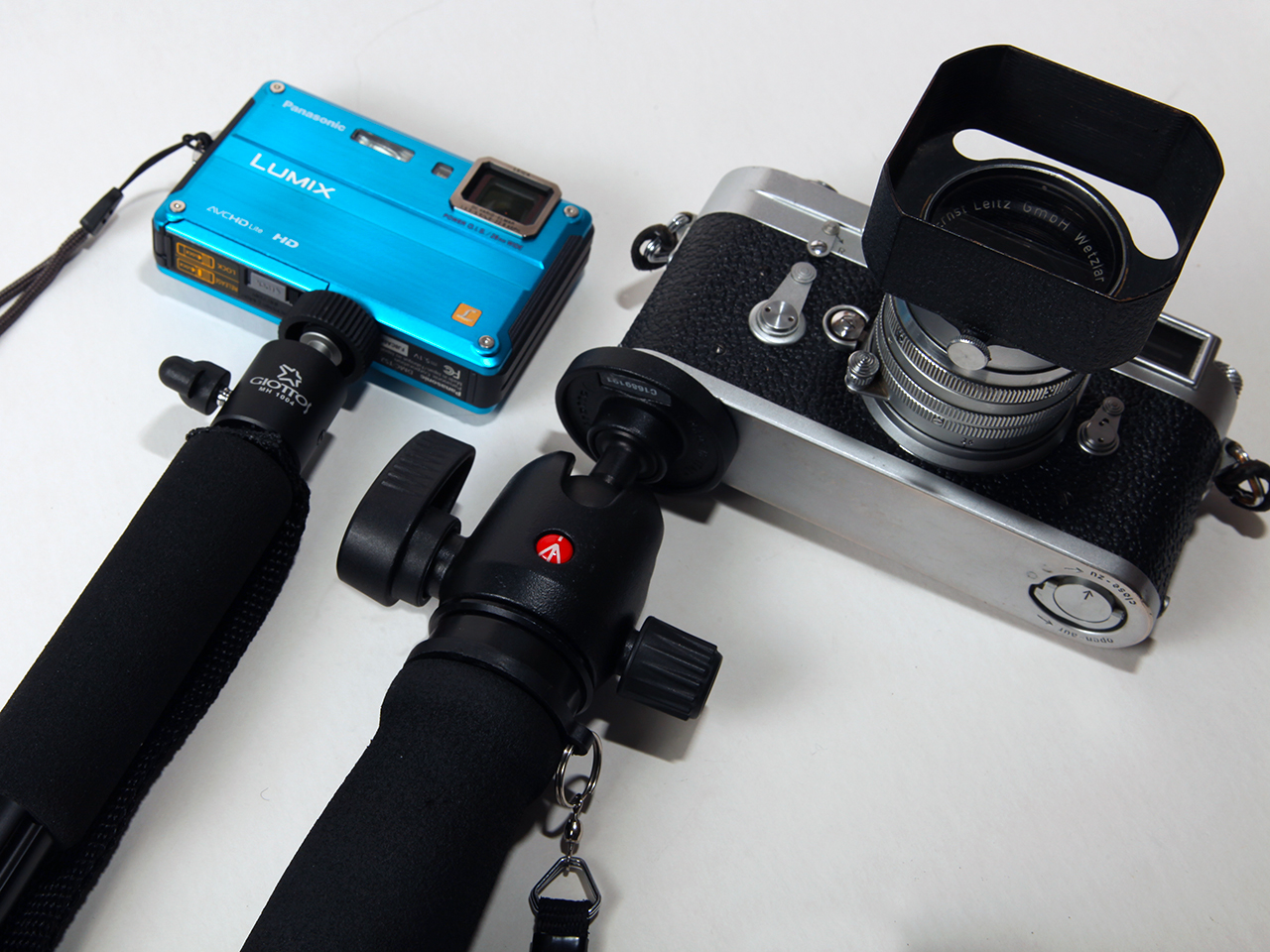 Lumix DMC-TS2A with Remington Shooter's Rest and Giottos MH 1004 ball head (L) beside MX450 monopod with Manfrotto 494 ball head and Leica M3